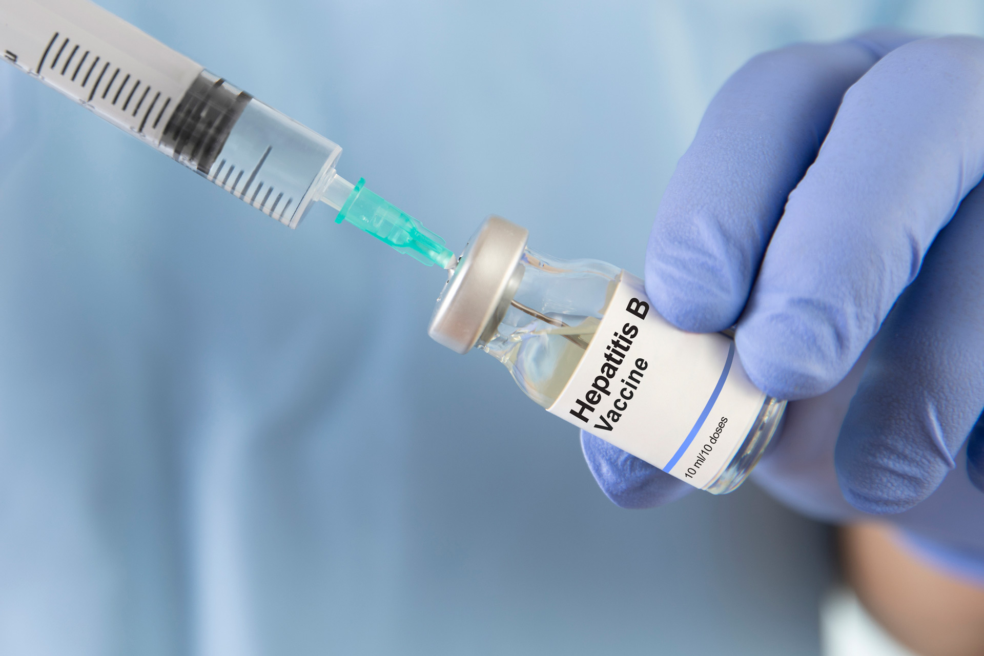 Syringe pulling Hepatitis B vaccine